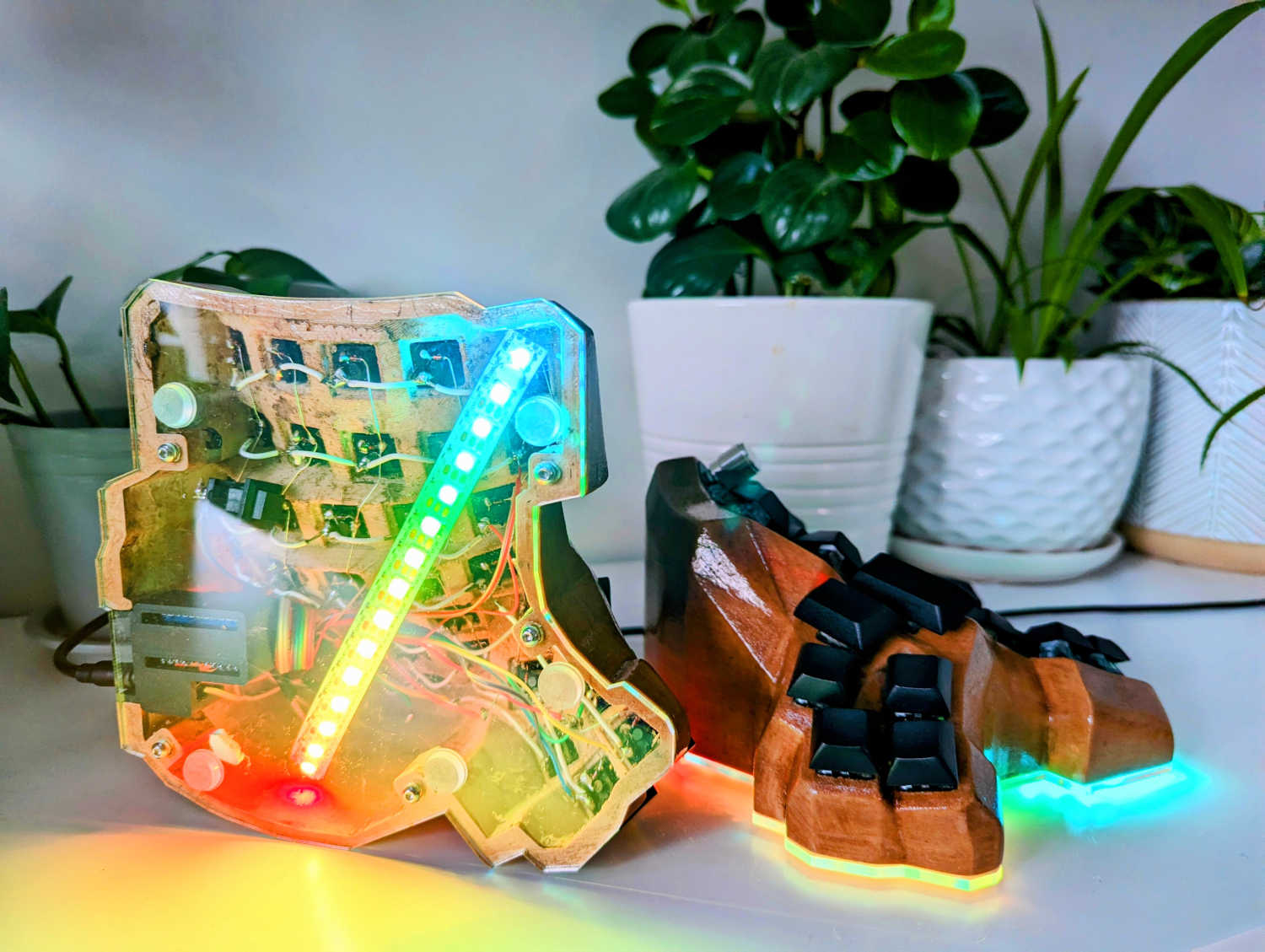 A picture of the finished keyboard, with one half showing the bottom and one half showing the side