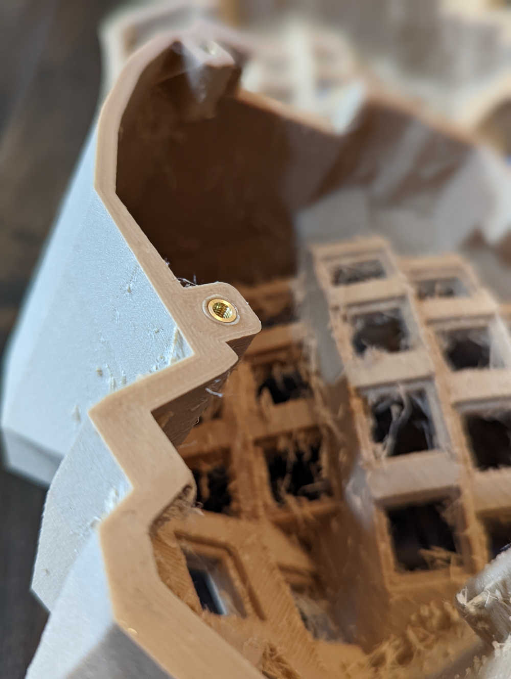 A picture of an installed heat-set insert